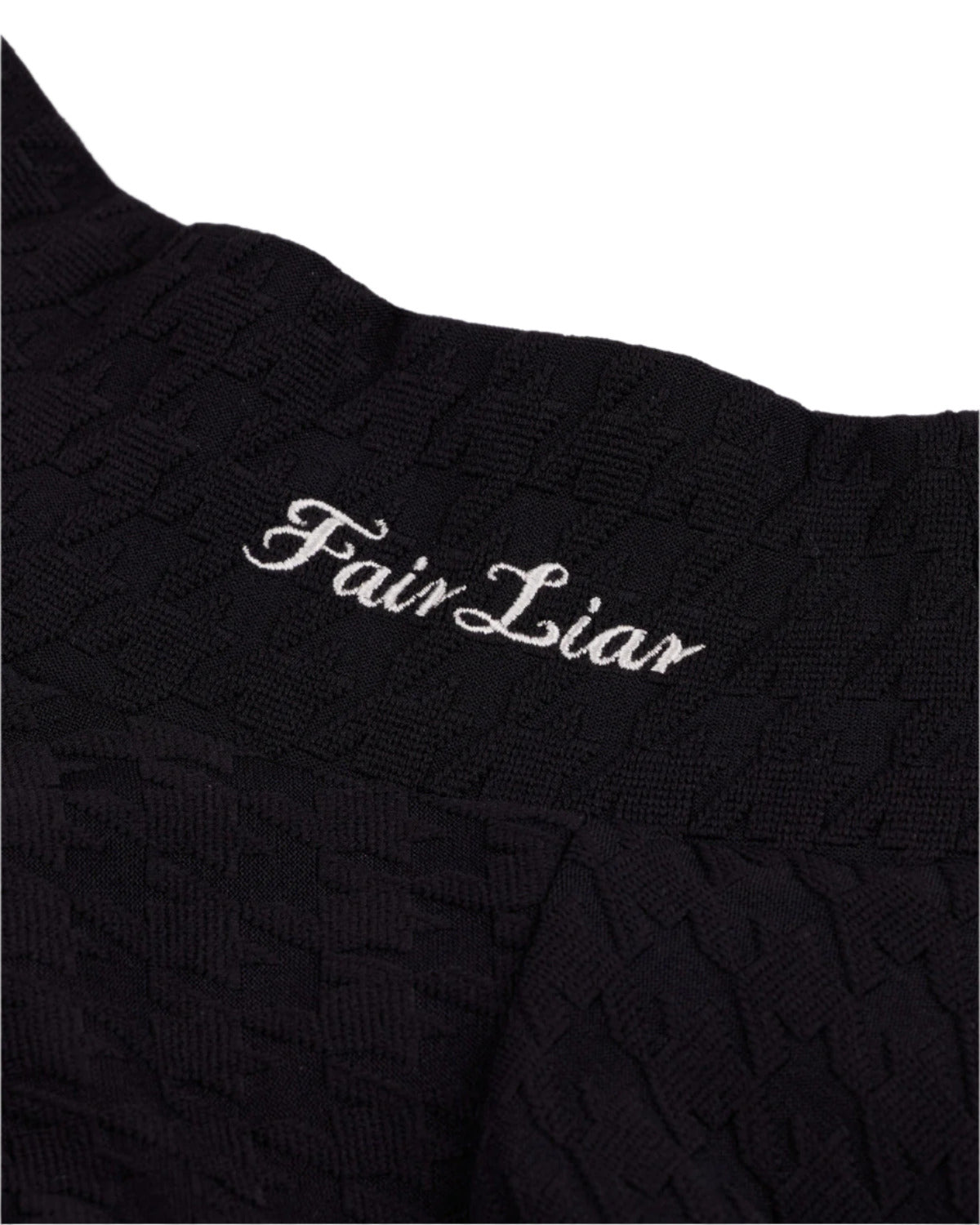 Women's black knit mock neck top by Fairliar