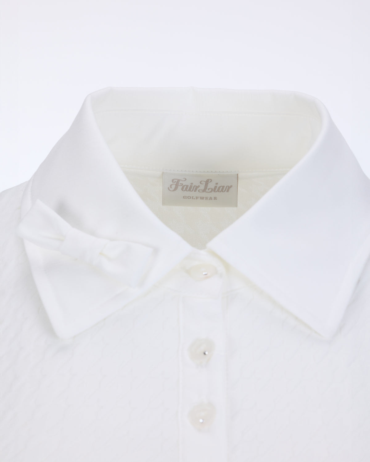 Women's white polo blouse with bow detail by Fairliar
