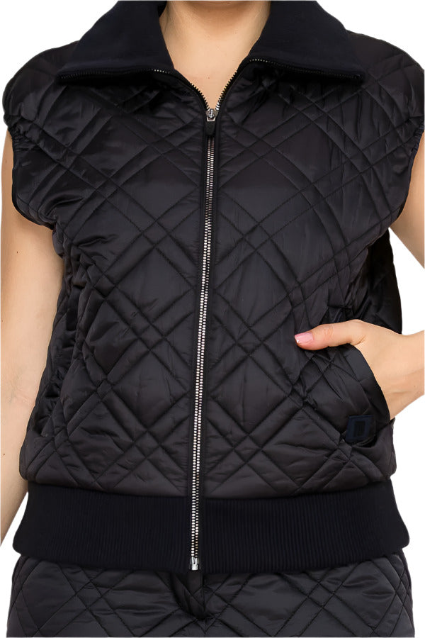 Women's quilted sleeveless vest by Torbist