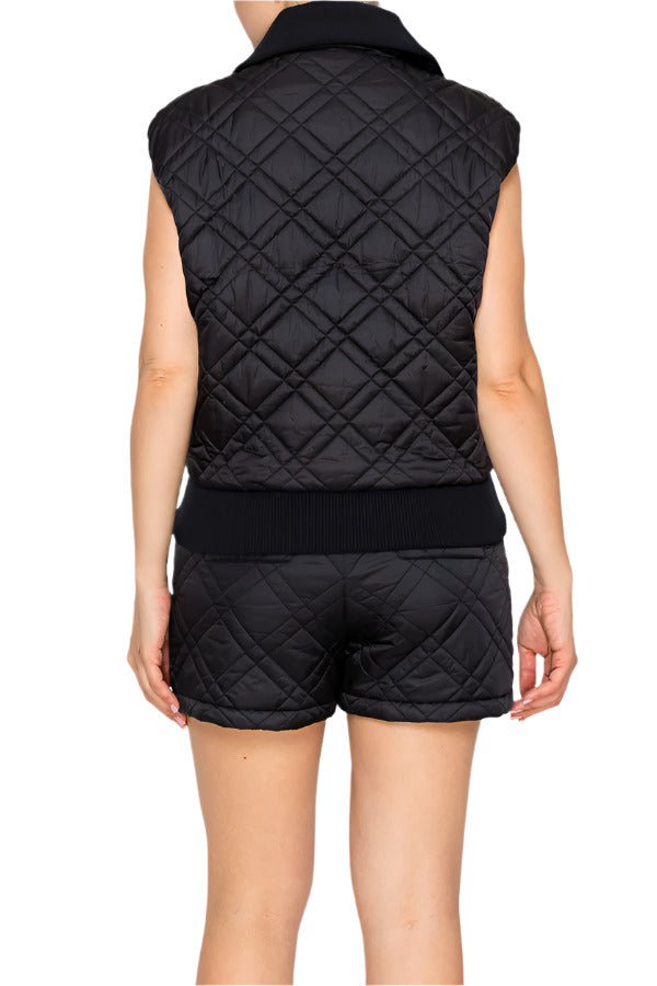 Women's quilted sleeveless vest by Torbist
